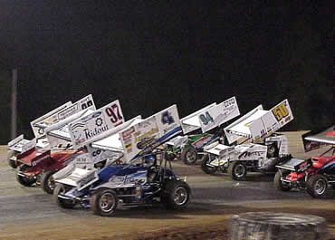 Shane Stewart, Aaron Berryhill and Travis Rilat lead the three-wide salute to the fans