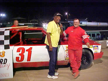 Greg Hainsey w/ pit reporter Tony Marshall