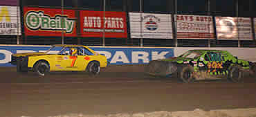 Jamey Hard and Shane Parker battle for the top spot in the mini stock feature