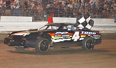 Greg Perkins won the street stock feature in his first night out at MMP (Photo by Phil Bowden)