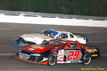 # 29 Allen Gordon moves under # 79 Tim Weaver for his charge to 4th place finish.