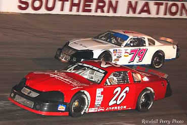 # 26 Andy Johnson again has good finish as he makes a pass on # 79 Tim Weaver.